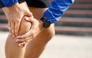running bad for your knees - man holding knee