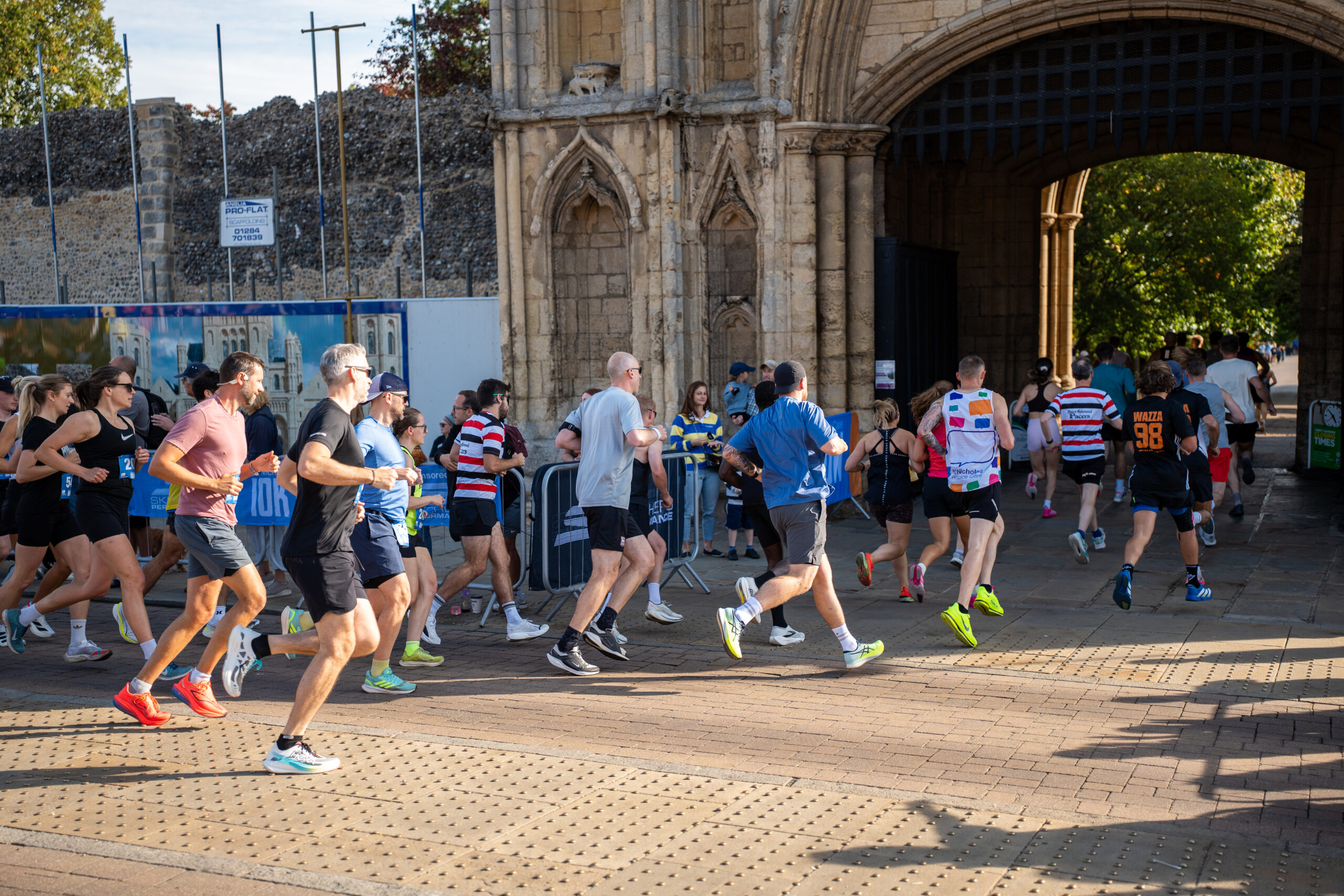 St Nicholas’ 10K Bury St Edmunds: Supporting Local Runners and Community Wellbeing Runners starting their race at the St Nicholas' 10K in Bury St Edmunds.