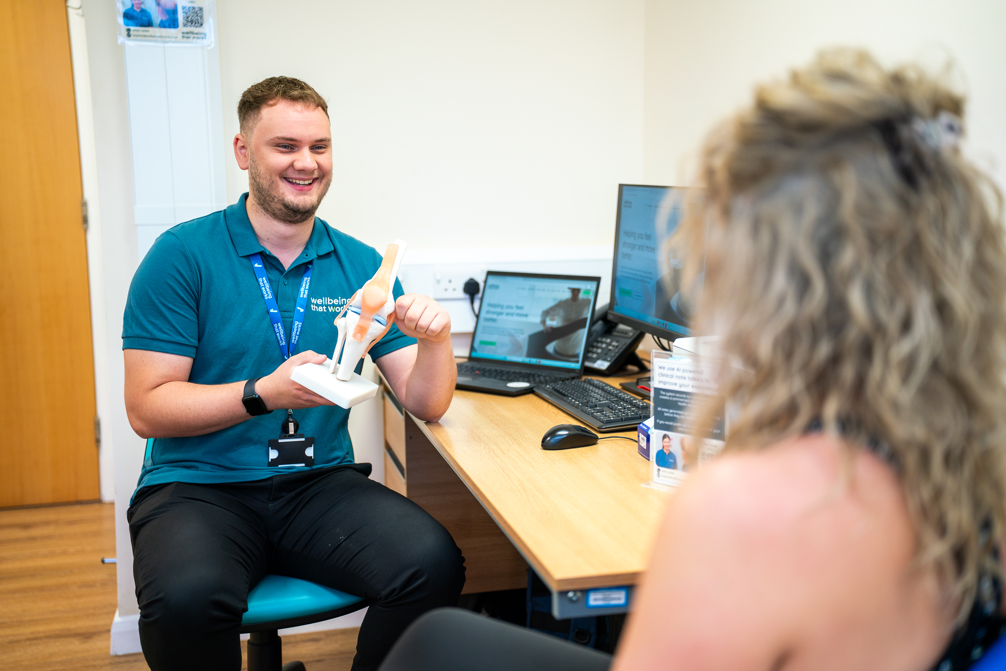 Physiotherapy Consultation Morton Hall Physiotherapist discussing symptoms and treatment goals with a patient during an initial consultation.